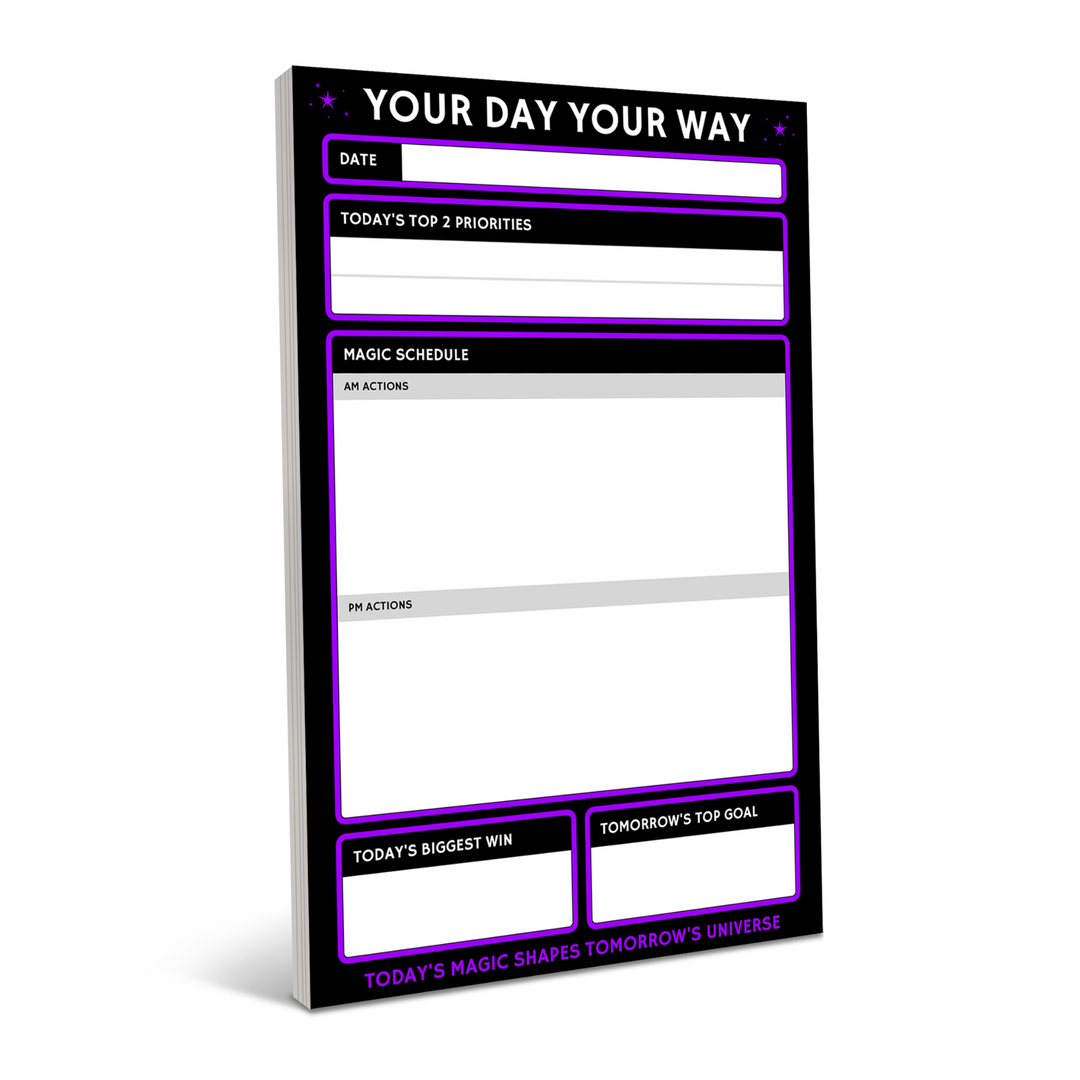 Notepad that has a section for date, priorities, schedule, today's biggest win, and tomorrow's top goal.