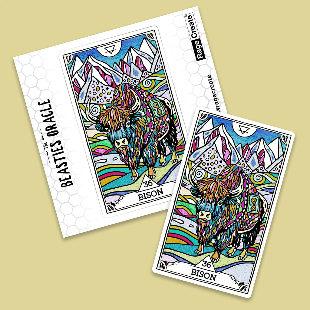 Two colorful tarot-style cards featuring an ornately illustrated bison with magenta, yellow, and blue patterns against a pale yellow background, showing front and angled views of the Beasties Oracle d
