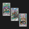 Three colorful tarot-style sticker cards featuring a sea turtle under radiating sunburst, a mystical bison surrounded by mountains, and a red panda with ornate psychedelic patterns on a black backgrou