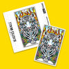 Two white sticker cards featuring an ornate tiger illustration with flame and flower motifs displayed at angles against a bright yellow background.