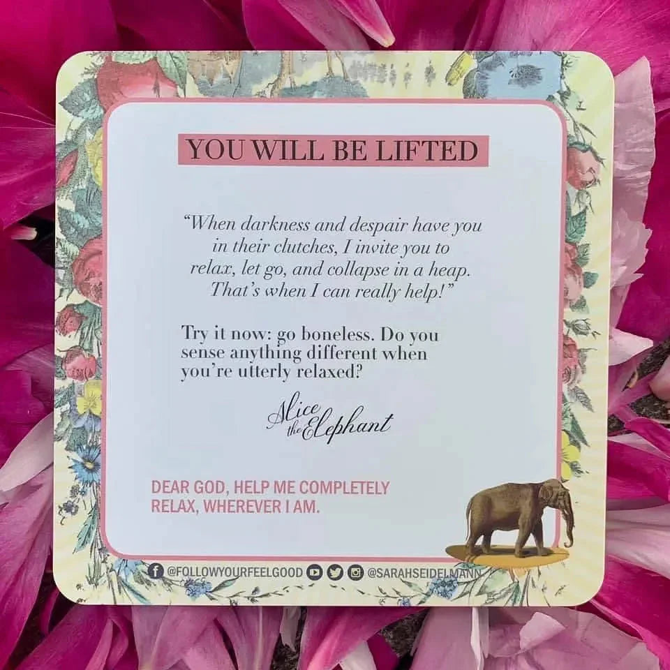 Inspirational card with 'You Will Be Lifted' header, featuring Alice the Elephant affirmation text on cream background with vintage floral border, displayed against bright magenta tulle fabric.