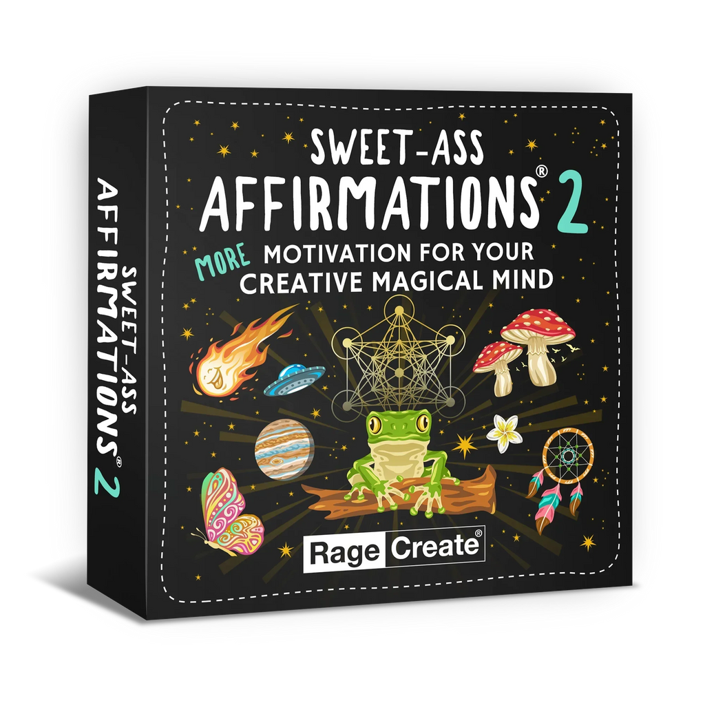 Black product box for Sweet-Ass Affirmations 2 featuring a green frog holding a sacred geometry symbol, surrounded by colorful mystical imagery including red mushrooms, a flaming meteor, dreamcatcher,