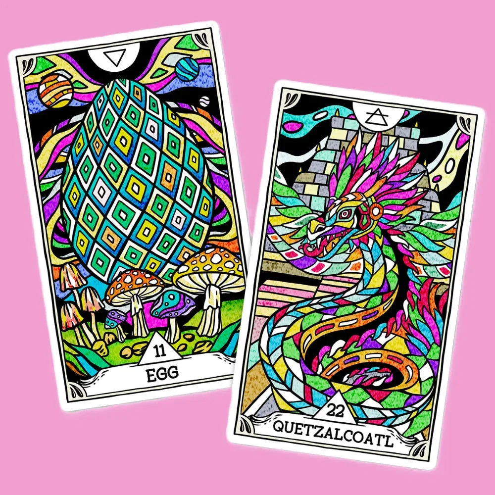 Two vibrant oracle cards from The Beasties deck displayed on a pink background: the Egg card (#11) featuring a geometric pattern with mushrooms and celestial symbols, and the Quetzalcoatl card (#22) s