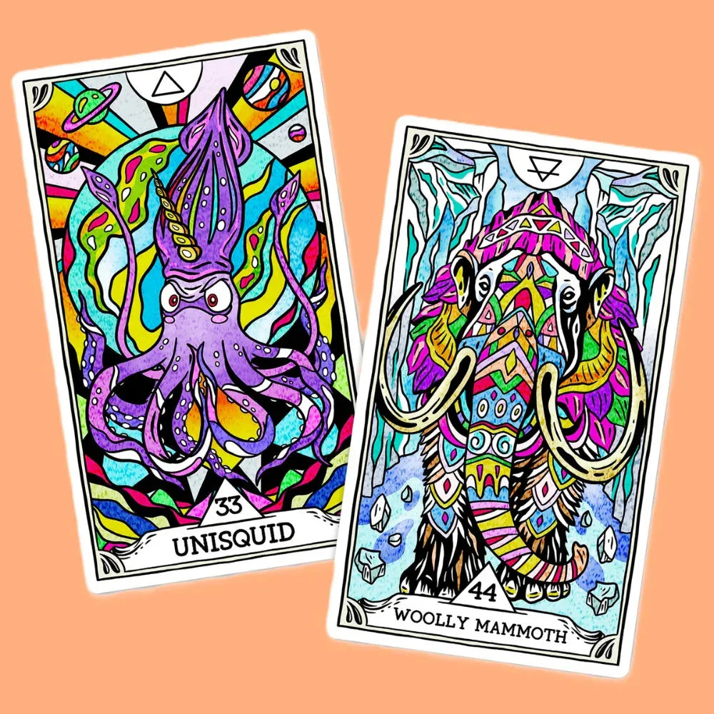 Two vibrant tarot-style oracle cards displayed at an angle against a peachy-orange background: the Unisquid card featuring a purple tentacled creature with bold multicolored patterns, and the Woolly M